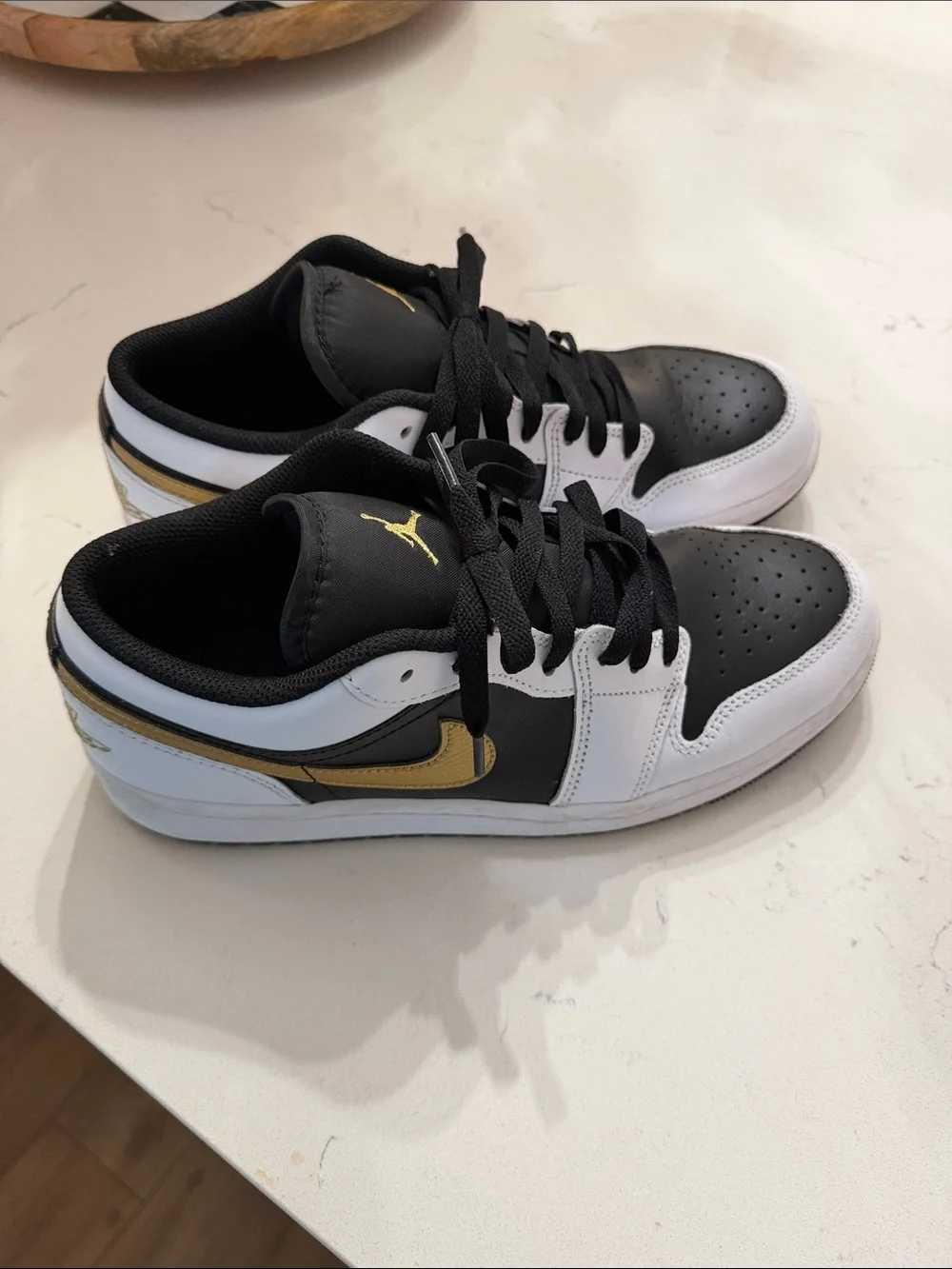 Jordan Low Top Sneakers in Black & Gold